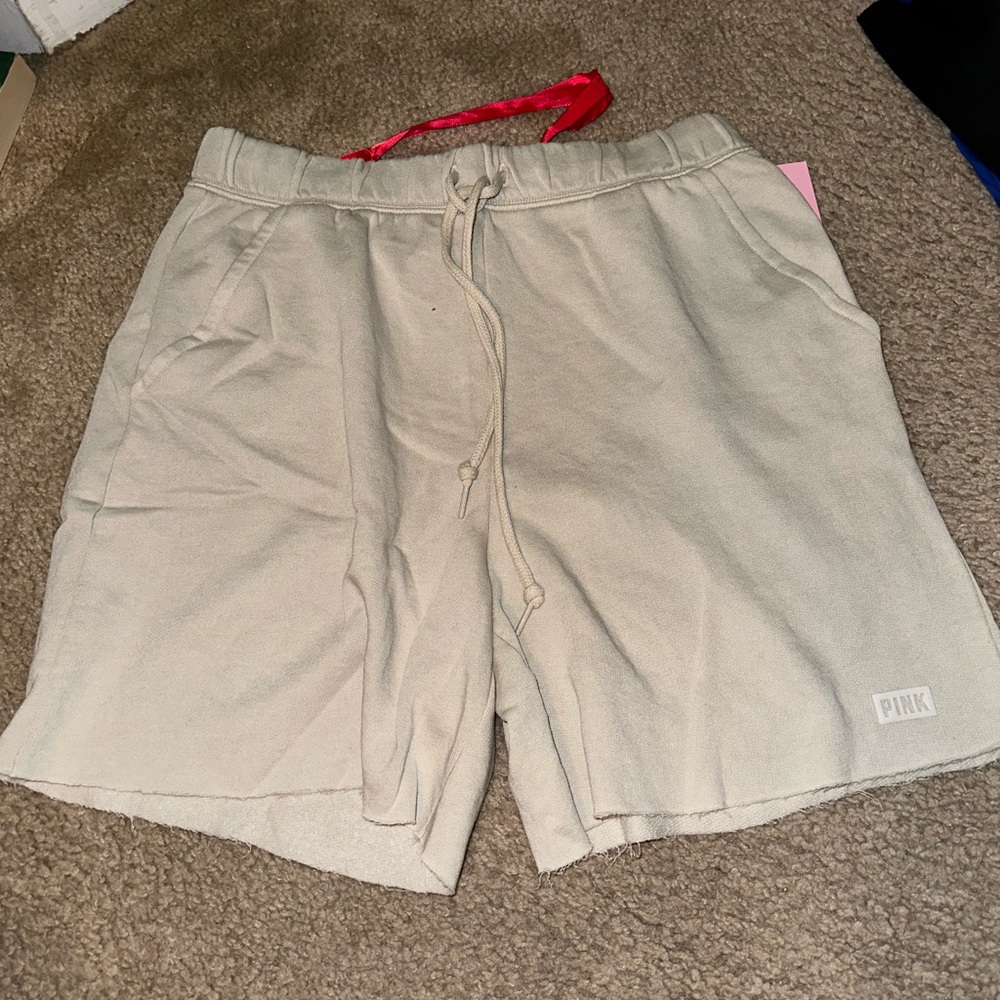 Pink logo dad shorts black and tan are new with tags. Gray is used. - Picture 7 of 10